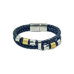 Men's leather bracelet with two black rope style bands and beading in silver and gold color. 
